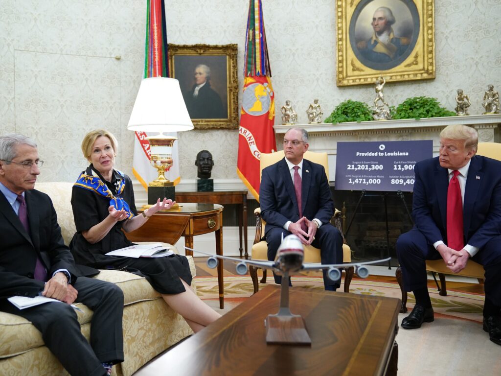 Dr. Anthony Fauci, left, director of the National Institute of Allergy and Infectious Diseases, listens as Dr. Deborah Birx, head of the White House coronavirus task force, talks during an Oval Office meeting with President Trump and Louisiana Gov. John Bel Edwards on Wednesday. Dr. Anthony Fauci, left, director of the National Institute of Allergy and Infectious Diseases, listens as Dr. Deborah Birx, head of the White House coronavirus task force, talks during an Oval Office meeting with President Trump and Louisiana Gov. John Bel Edwards on Wednesday. (Mandel Ngan/AFP via Getty Images)