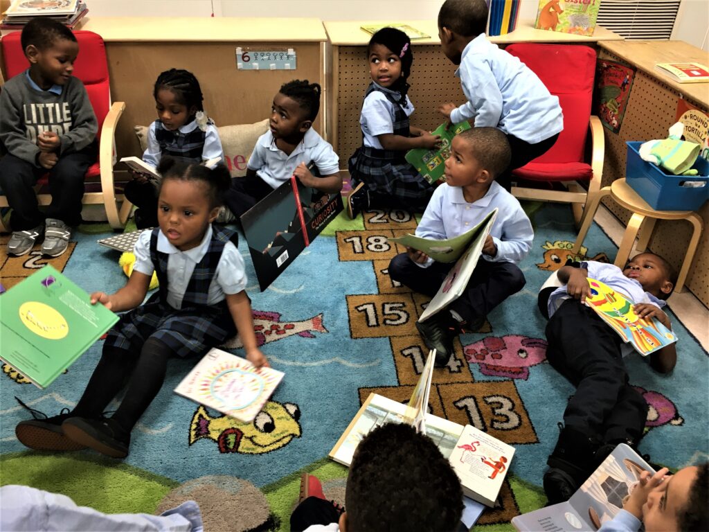 Kids gather to read at Xavier's Family Childcare.