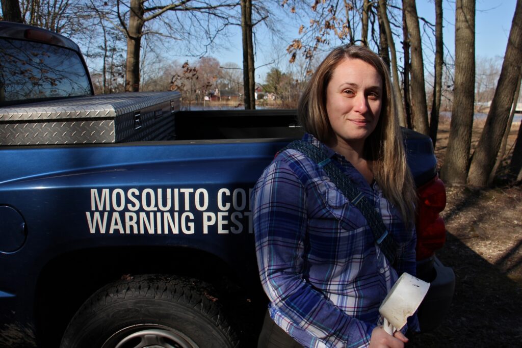 2020 03 09-e lee-autumn angelus-new jersey elmer lake-mosquito control truck Entomologist Autumn Angelus prepares to set out on a mosquito collecting expedition at Elmer Lake Wildlife Management Area in Salem County, New Jersey. (Emma Lee/WHYY)