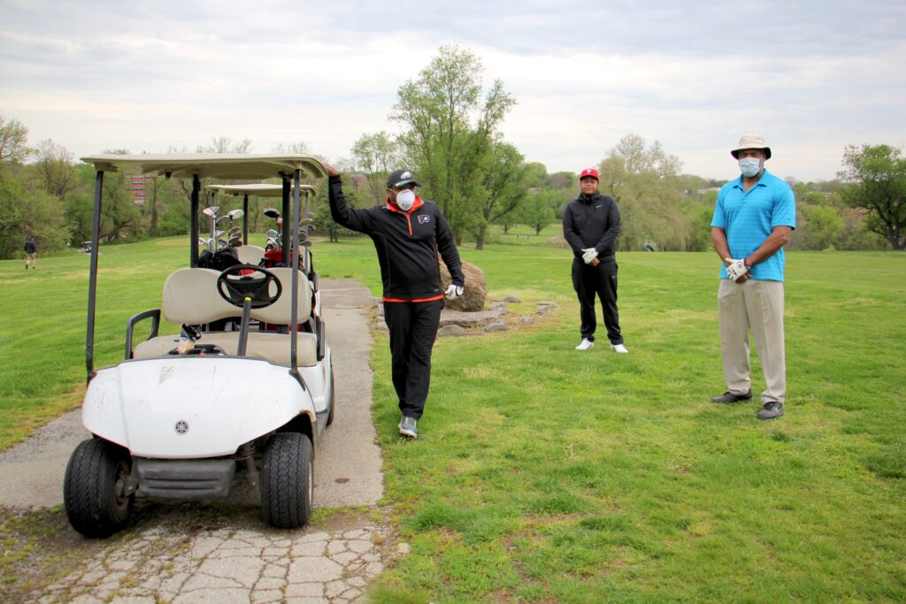 2020 05 03-e lee-bernard turner eric hill chet turner-philadelphia juniata golf club-reopening Golfers practice social distancing at Juniata Golf Club. Chet Turner (right) of Yardley, Pa., played the course Sunday morning with his brother, Bernard (left) and friend, Eric Hill. (Emma Lee/WHYY)