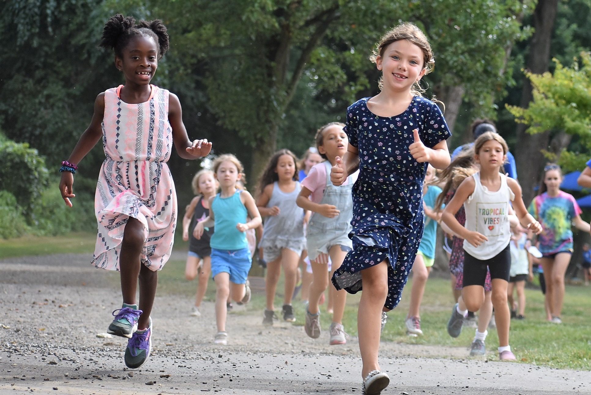 Campers run at Liberty Lake Day Camp in Mansfield Township, N.J. 