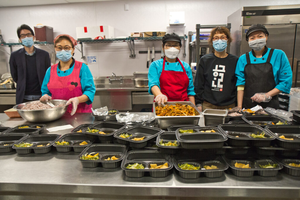 2020 5 5 k paynter passi donations-4 From left, PASSi managing director Ken Yang, chef Jeom Sun Cho, chef Okseo Okyeon, director Insook Seol, and chef Nguyet Tran. (Kimberly Paynter/WHYY)