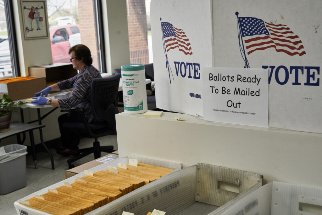 Virus Outbreak Nebraska Primary In this April 14, 2020 photo, mail-in ballots are ready to be mailed. (AP Photo/Nati Harnik)