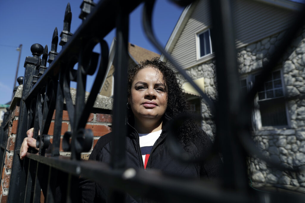 Nelis Rodriguez poses at her home in Chicago, Thursday, May 7, 2020. (AP Photo/Nam Y. Huh)
