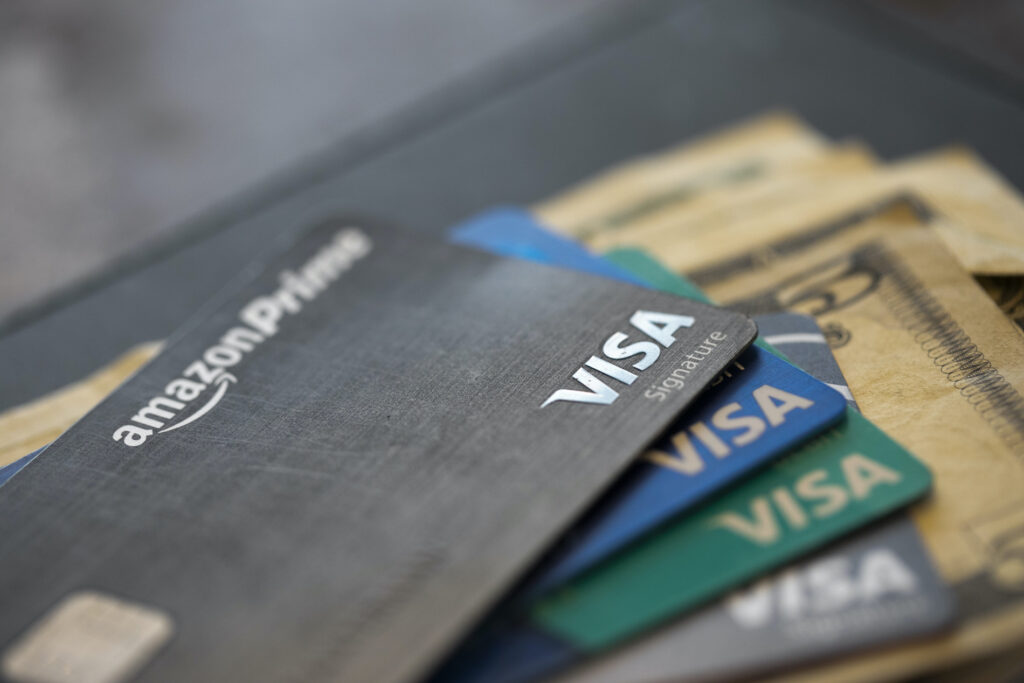 Consumer Borrowing This Aug. 11, 2019 file photo shows credit cards in New Orleans. (AP Photo/Jenny Kane)