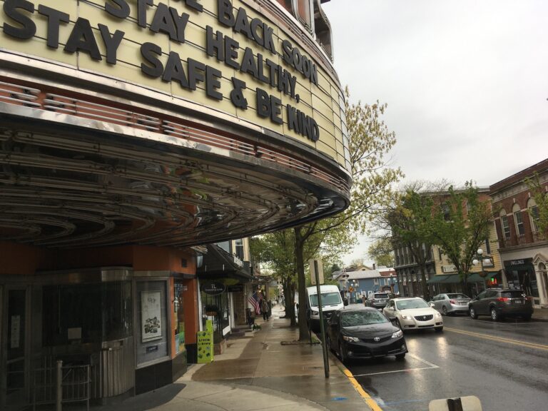 The marquee of the Campus Theatre in downtown Lewisburg, P.a, on Friday, May 8, 2020, tells moviegoers it hopes to reopen soon. Some of the retail shops in the town’s Market Street shopping strip reopened after about two months on Friday, with a  trickle of customers, as Union County was considered to be safe enough to begin to loosen social distancing restrictions. (AP Photo/Mark Scolforo)
