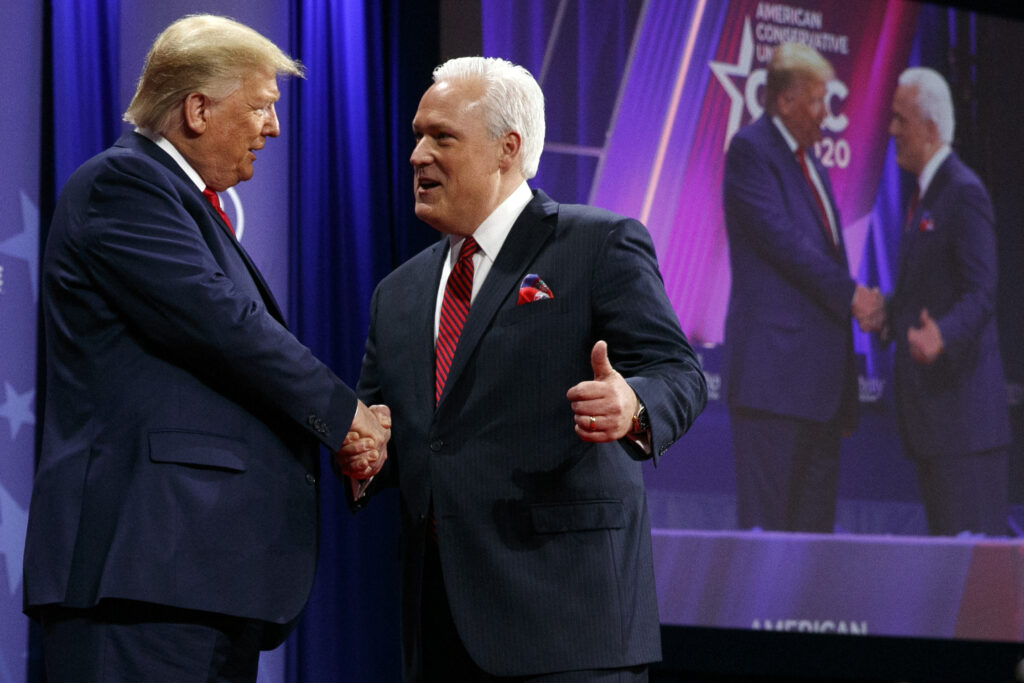 Donald Trump, Matt Schlapp In this Feb. 29, 2020, file photo, President Donald Trump is greeted by Matt Schlapp, Chairman of the American Conservative Union, as the president arrives to speak at the Conservative Political Action Conference, at National Harbor, in Oxon Hill, Md. (AP Photo/Jacquelyn Martin, File)