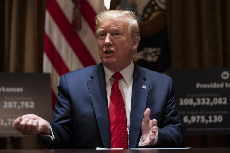 President Donald Trump speaks during a meeting with Arkansas Gov. Asa Hutchinson, and Kansas Gov. Laura Kelly, in the Cabinet Room of the White House, Wednesday, May 20, 2020, in Washington. (AP Photo/Evan Vucci)