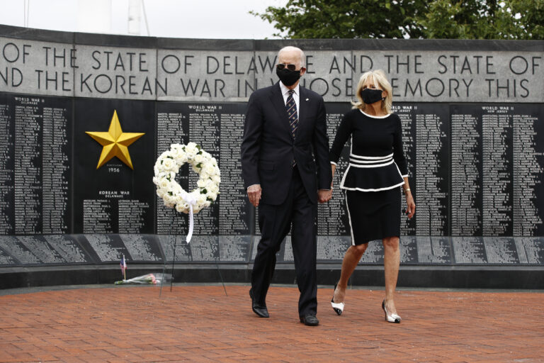 Democratic presidential candidate, former Vice President Joe Biden and Jill Biden depart after placing a wreath at the Delaware Memorial Bridge Veterans Memorial Park, Monday, May 25, 2020, in New Castle, Del. (AP Photo/Patrick Semansky)