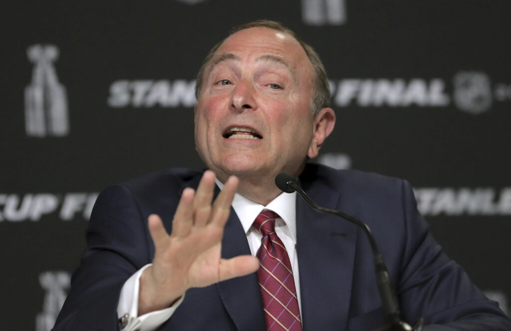 Gary Bettman In this May 27, 2019, file photo, NHL Commissioner Gary Bettman speaks to the media before Game 1 of the NHL hockey Stanley Cup Finals between the St. Louis Blues and the Boston Bruins, in Boston. (AP Photo/Charles Krupa, File)