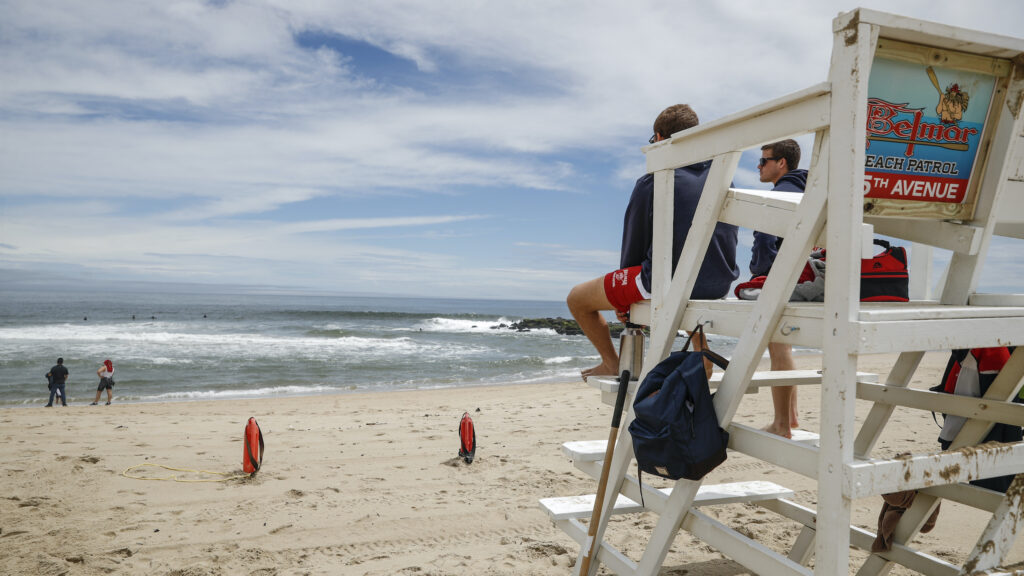 AP_memorial_day_weekend_NJ_beach_052420.jpg Lifeguards keep watch at a beach