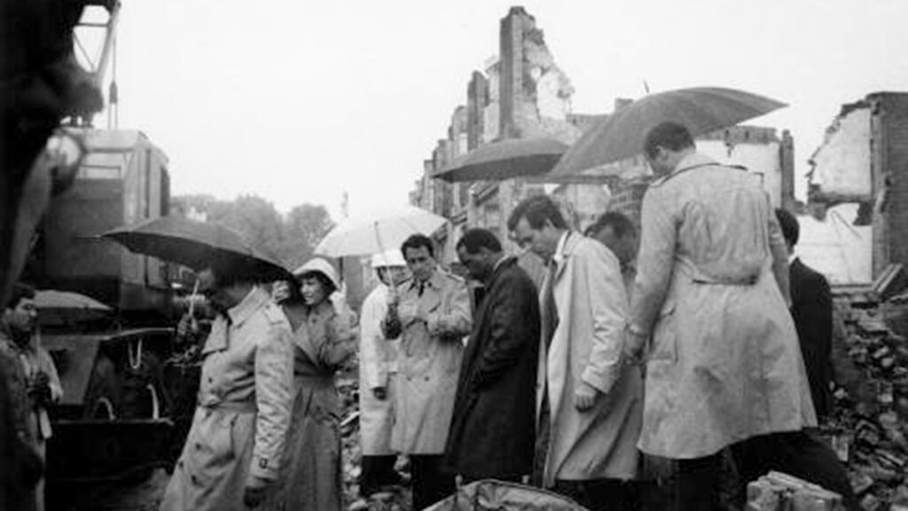 Officials inspect the demolished MOVE headquarters after the bombing in 1985.