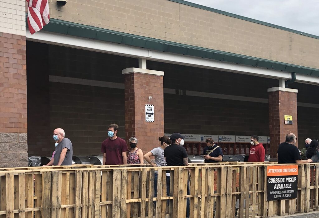 Home depot Sunday Customers lined up with masks and mostly maintained their distance Sunday at the Home Depot near Newark, Delaware. (Cris Barrish/WHYY)