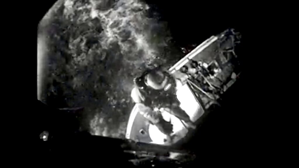 IMG-2386 A screen capture from a U.S. Coast Guard video of the successful hoisting of two people from a grounded fishing vessel in the Barnegat Inlet Wednesday night. (U.S. Coast Guard)