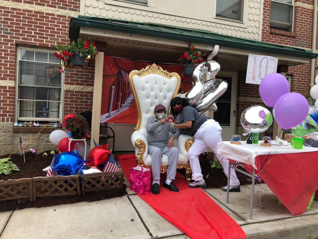 Image from iOS (32) Narberth Rice poses with granddaughter Harriet Rice at his 102nd birthday celebration. (Layla A. Jones/WHYY)