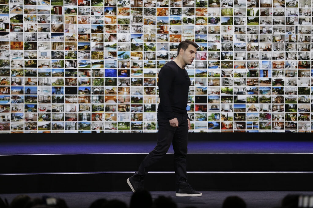 Airbnb co-founder and CEO Brian Chesky during an event in 2018. On Tuesday, the company announced it is laying off 1,900 employees, or about a quarter its workforce, as the coronavirus rattles the travel industry. Airbnb co-founder and CEO Brian Chesky during an event in 2018. On Tuesday, the company announced it is laying off 1,900 employees, or about a quarter its workforce, as the coronavirus rattles the travel industry. (Eric Risberg/AP Photo)