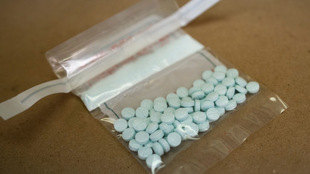 Tablets believed to be laced with fentanyl are displayed at the Drug Enforcement Administration Northeast Regional Laboratory on Oct. 8, 2019, in New York. According to the DEA, one drug that remains widely available in much of the U.S. is fentanyl, a synthetic opioid. Tablets believed to be laced with fentanyl