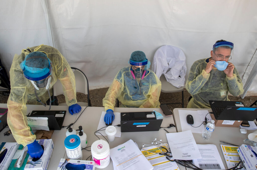 A COVID-19 testing operation in Boyle Heights, California. Daily case counts may be on the low side since access to testing is limited in some parts of the world. A COVID-19 testing operation in Boyle Heights, California. Daily case counts may be on the low side since access to testing is limited in some parts of the world. (Brian van der Brug/Los Angeles Times via Getty Images)