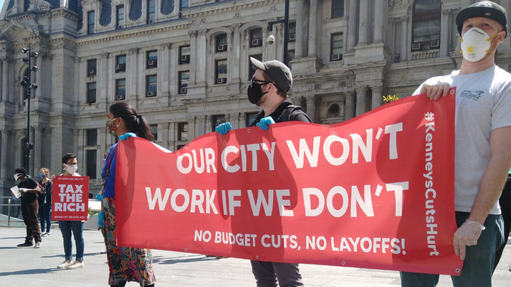 protest-kenneybudgetcuts-cityhall City employees staged a socially distant rally outside City Hall to protest planned layoffsTWITTER / @TERRAOLVR