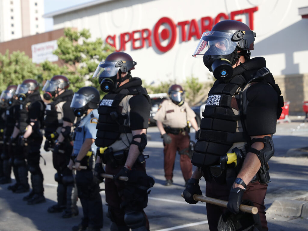 Minnesota State Police formed a barricade in front of a Target store in the city of St. Paul.