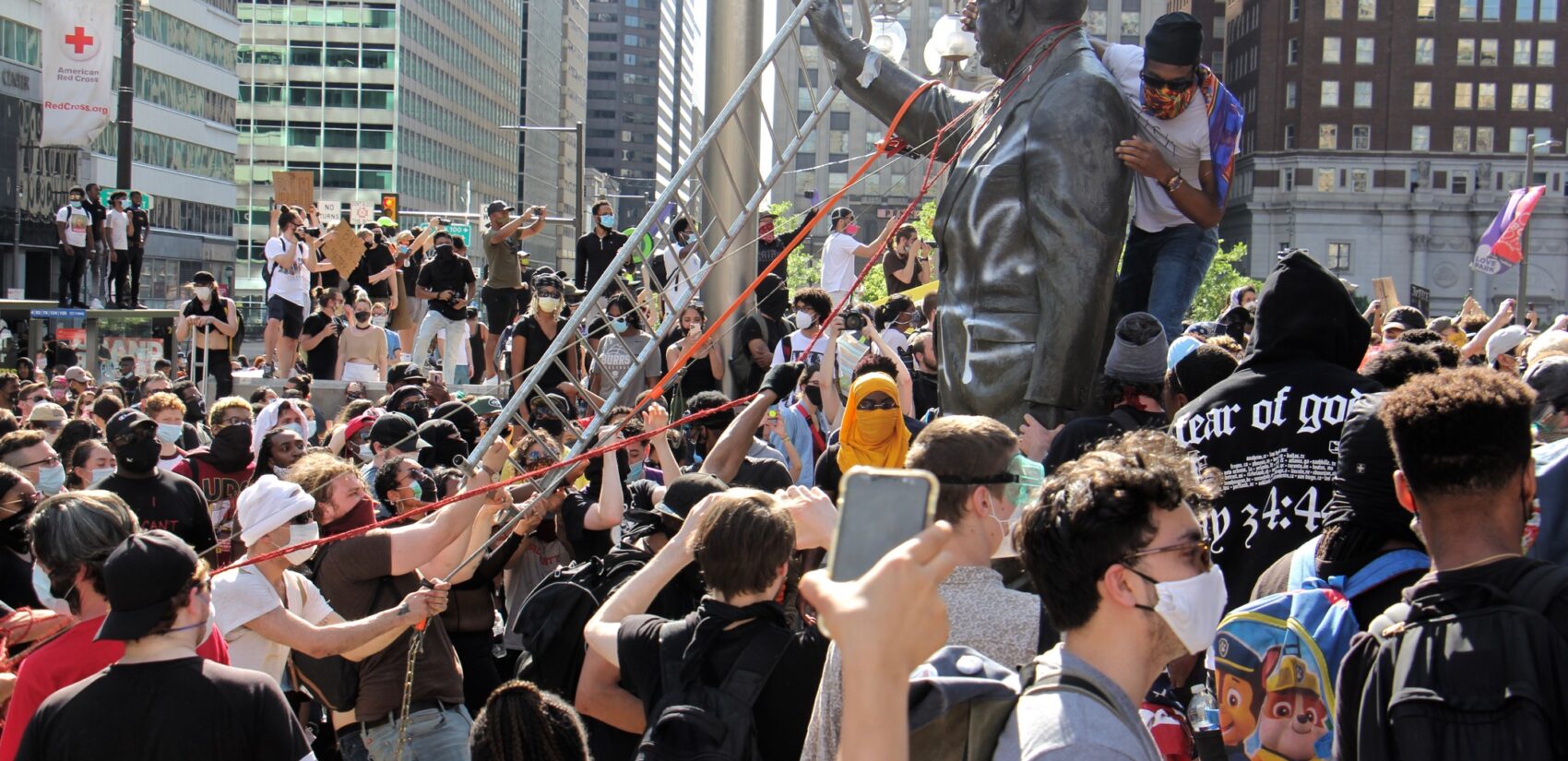 Protesters try to take down the statue of former mayor and police chief Frank Rizzo