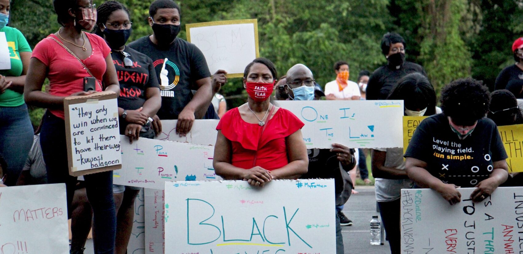 Protesters kneel for 8 minutes and 46 seconds