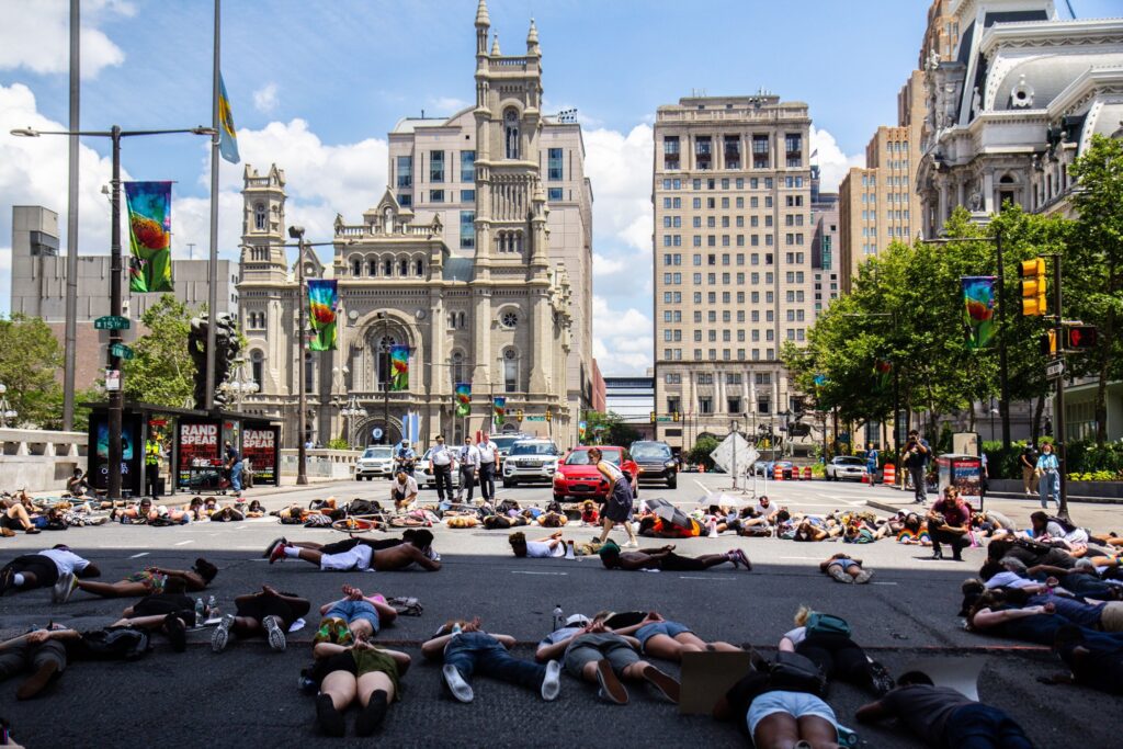2020- 06 19-k paynter-philadelphia jfk boulevard-juneteenth protest lie down in the street Protesters lay in the intersection of 15th and JFK