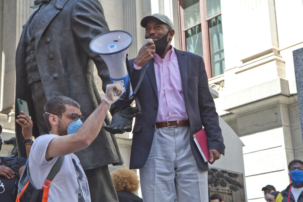 2020 6 1 k paynter NAACP rodney muhammad-2 Philadelphia NAACP President Rodney Muhammad speaks at a peaceful protest at City Hall. (Kimberly Paynter/WHYY)