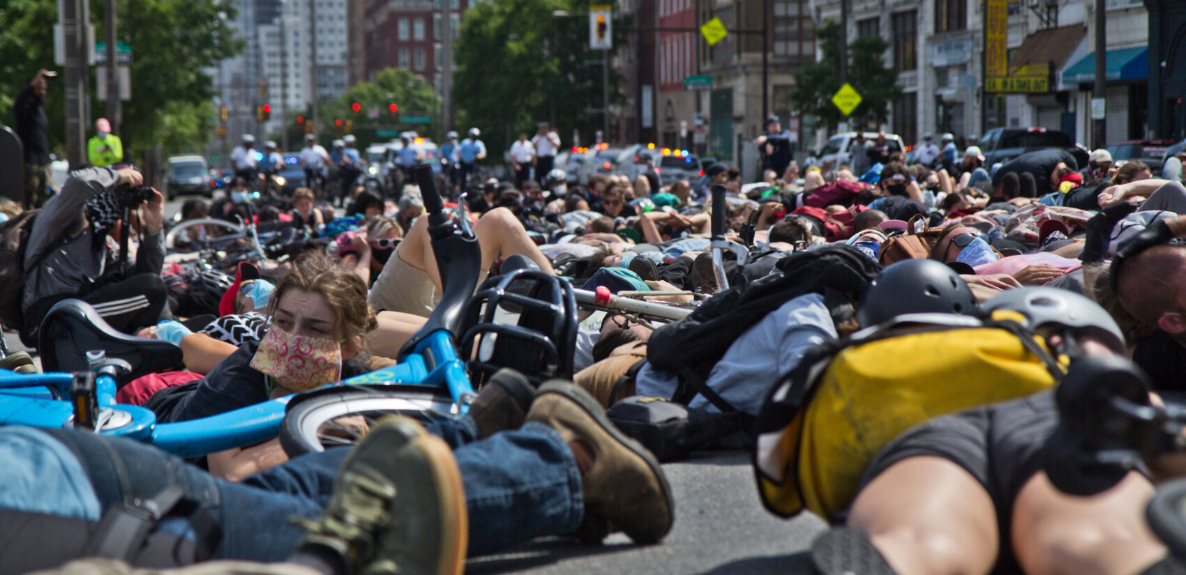 Protesters lie down on the North section of Broad Street