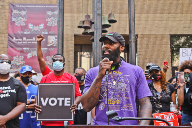 Former Philadelphia Eagles Safety Malcolm Jenkins called for reform outside the African American Museum of Philadelphia. (Kimberly Paynter/WHYY)