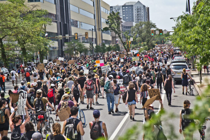 Thousands of protesters marched through Philadelphia as the week-long demonstrations continued Saturday. (Kimberly Paynter/WHYY)