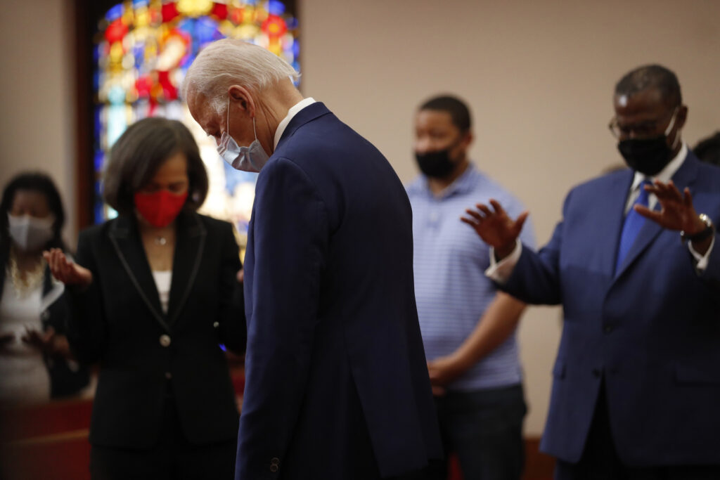 Joe Biden Democratic presidential candidate, former Vice President Joe Biden bows his head in prayer during a visit to Bethel AME Church in Wilmington, Del., Monday, June 1, 2020. (AP Photo/Andrew Harnik)