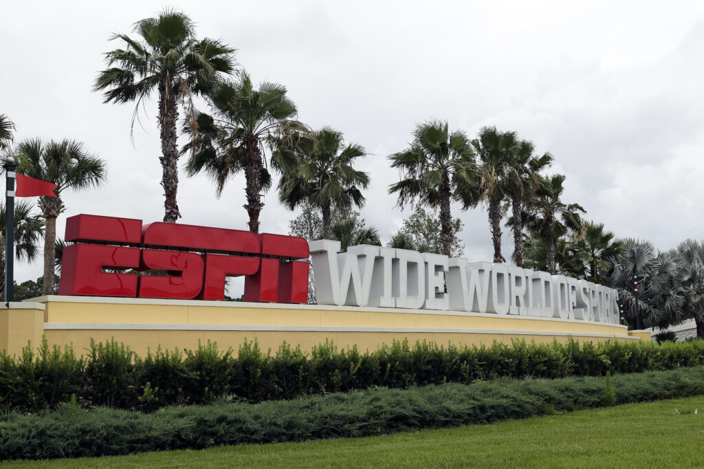 Virus Outbreaks NBA Basketball A sign marking the entrance to ESPN's Wide World of Sports at Walt Disney World is seen Wednesday, June 3, 2020, in Kissimmee, Fla. (AP Photo/John Raoux)