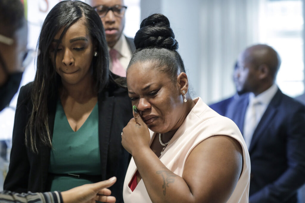 Tomika Miller Tomika Miller, center, widow of Rayshard Brooks cries as she leaves a news conference, Wednesday, June 17, 2020 in Atlanta. Fulton County District Attorney Paul L. Howard Jr. announced former Atlanta Police Officer Garrett Rolfe faces charges including felony murder in the fatal shooting of Rayshard Brooks on June 12. (AP Photo/Byrnn Anderson)