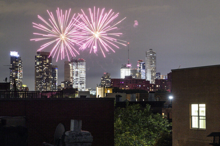 Fireworks explode during Juneteenth celebrations above the Bedford-Stuyvesant neighborhood in the Brooklyn borough of New York, Friday, June 19, 2020. (AP Photo/John Minchillo)