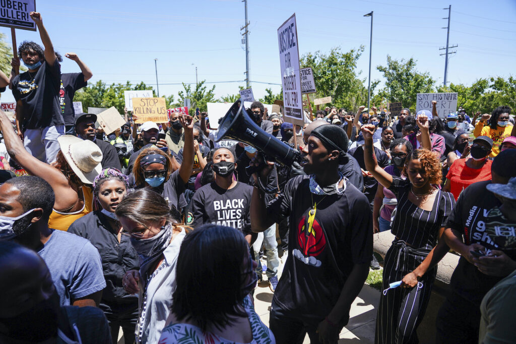 Protesters march, Saturday, June 13, 2020, in Palmdale, Calif.