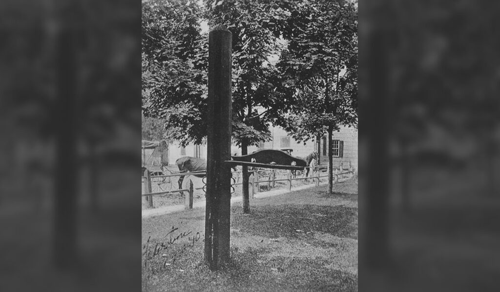 Georgetown-whipping-post The whipping post in Georgetown, seen here in photo from the Delaware Public Archives, had been on display in the center of town since 1993. It will be taken down as of July 1. (courtesy Delaware Public Archives)