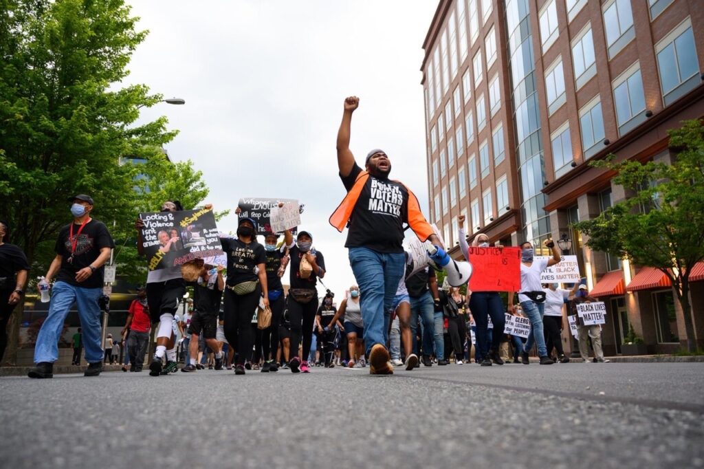 IMG_7594 Coby Owens leads marchers through Wilmington during a protest that was peaceful from start to finish. (Courtesy of Coby Owens)