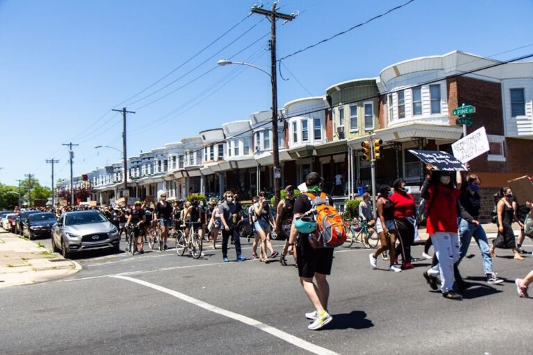 Protesters in West Philadelphia marched from the site of the MOVE bombing to Malcolm X park in protest of racial injustice. (Kimberly Paynter/WHYY)