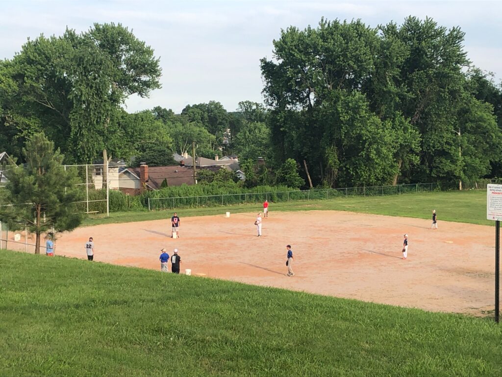 A youth baseball team practices this week in Pike Creek. (Cris Barrish/WHYY)
