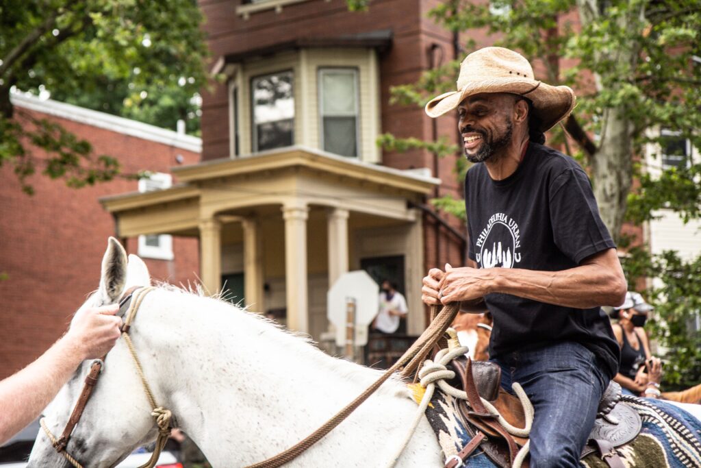 Al Lynch rode his horse to Malcolm X Park from North Philadelphia to celebrate Juneteenth. (Kimberly Paynter/WHYY)