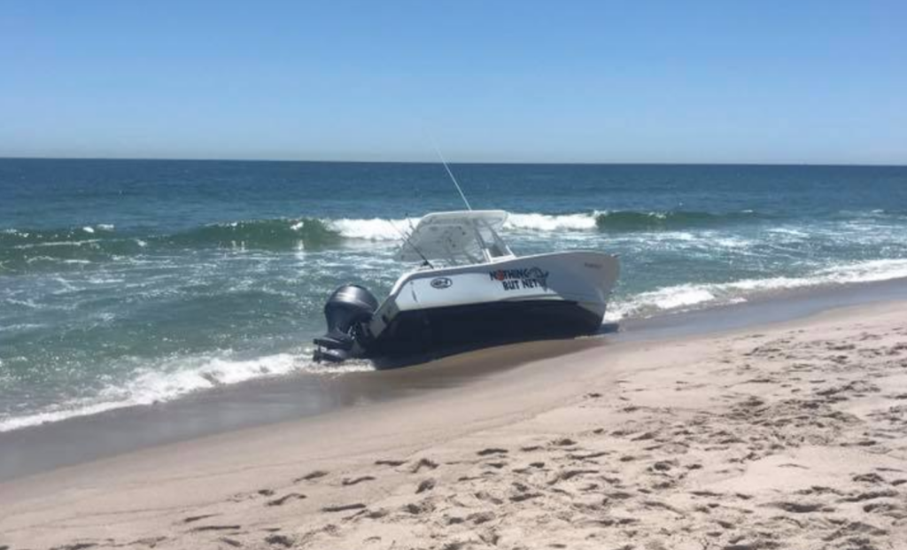 Screen Shot 2020-06-08 at 2.35.20 PM A boat on the shoreline in Seaside Park are colliding with a whale Monday morning. (Image courtesy of Friends of Seaside Park via Facebook)