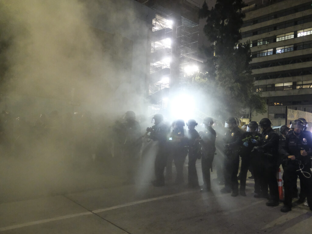 Police officers fire rubber bullets May 29 during a Los Angeles protest over the death of George Floyd. Police officers fire rubber bullets May 29 during a Los Angeles protest over the death of George Floyd. (Ringo H.W. Chiu/AP Photo)
