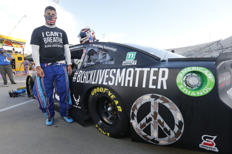 NASCAR driver Bubba Wallace waits for the start of a Cup Series auto race in Martinsville, Va., on June 10.
