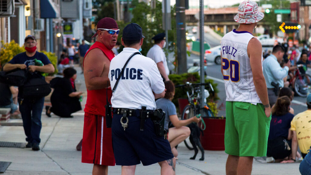 endracism-fishtownprotest-01crop A Fishtown resident chats with a police officer during the 'End Racism Now' gathering on June 9, 2020. (Domenic Malandro/Darkside Media, LLC)
