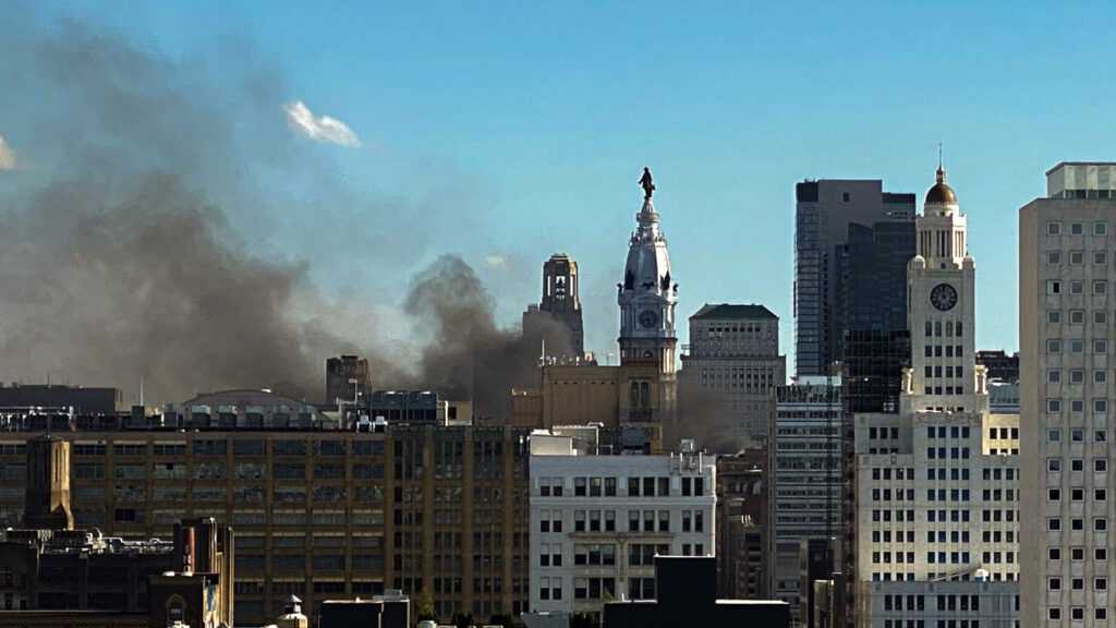 floydprotests-smoke-skyline-crop Smoke rises from cars on fire during the widespread protests in Philadelphia (Danya Henninger/Billy Penn)