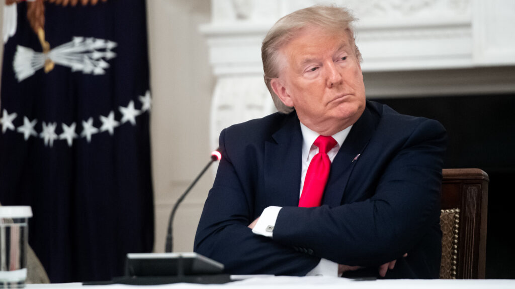 President Trump, seen here during a meeting Thursday at the White House, shared a video on Twitter with a fake CNN headline. The social media network flagged the doctored footage as “manipulated media.” President Donald Trump