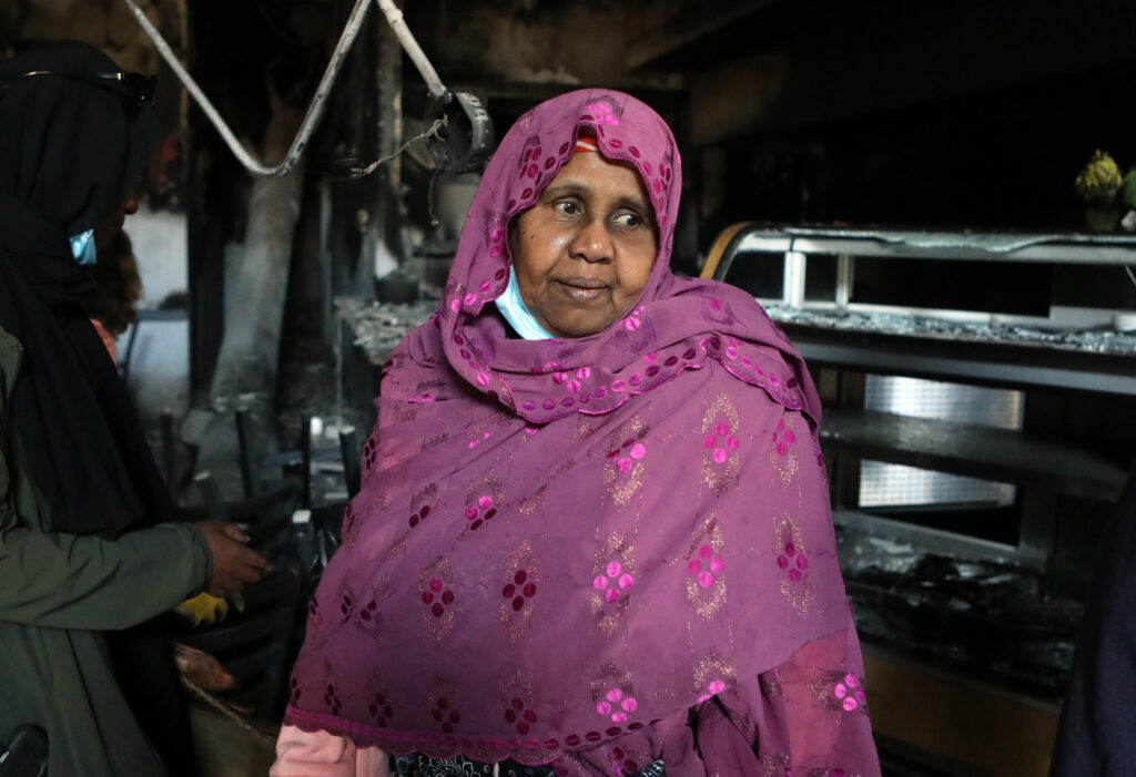 Safia Munye looks over the remains of her restaurant, Mama Safia’s Kitchen, on Saturday. It was destroyed last week during protests in Minneapolis. Safia Munye looks over the remains of her restaurant, Mama Safia's Kitchen, on Saturday. It was destroyed last week during protests in Minneapolis.
