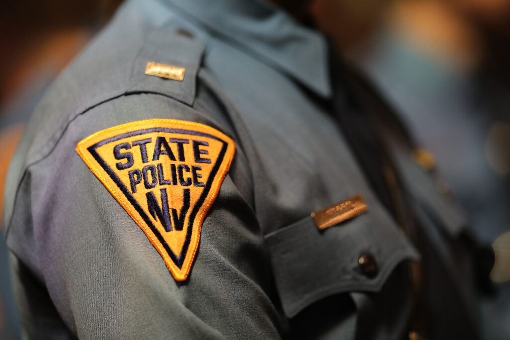 A close-up of a New Jersey State Police Officer's uniform