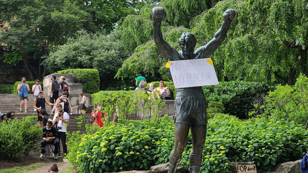 rocky-floydprotests-sign-crop (Mark Henninger/Imagic Digital)